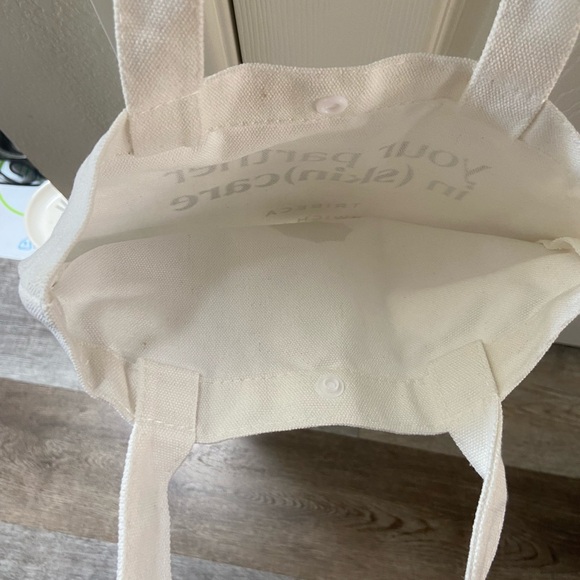 NWOT beige canvas tote bag with snap closure - Picture 5 of 5